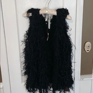 Black shaggy vest